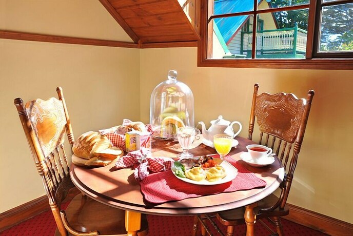 Imagen de la habitación del Hotel Mary Card's Coach House. Foto 19