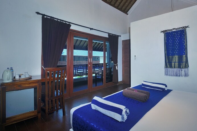 Imagen de la habitación del Hotel Marygio Resort. Foto 16