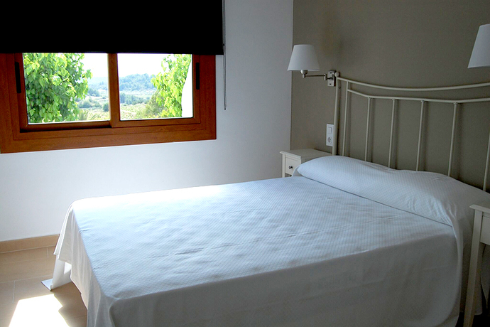 Imagen de la habitación del Hotel Mas Boronat. Foto 4