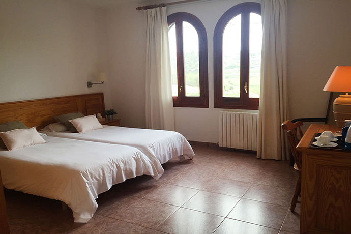 Imagen de la habitación del Hotel Mas Boronat. Foto 5