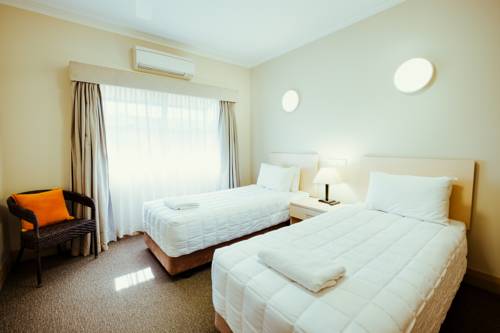 Imagen de la habitación del Hotel Mas Country Club Motor Inn. Foto 4