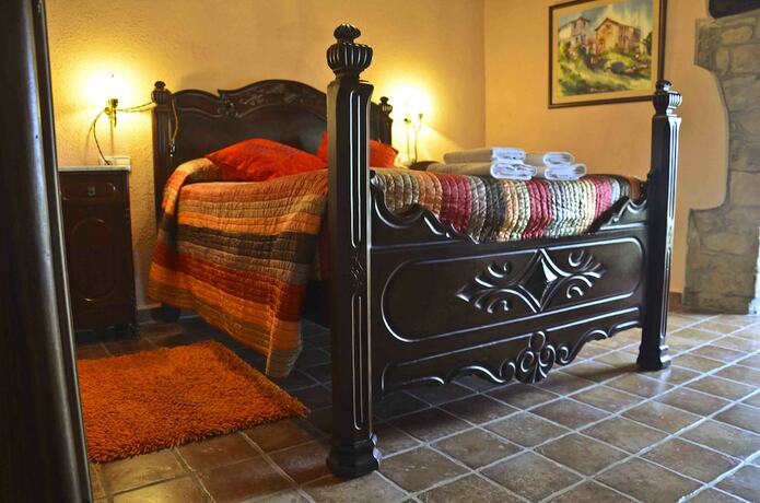 Imagen de la habitación del Hotel Mas Postius. Foto 16