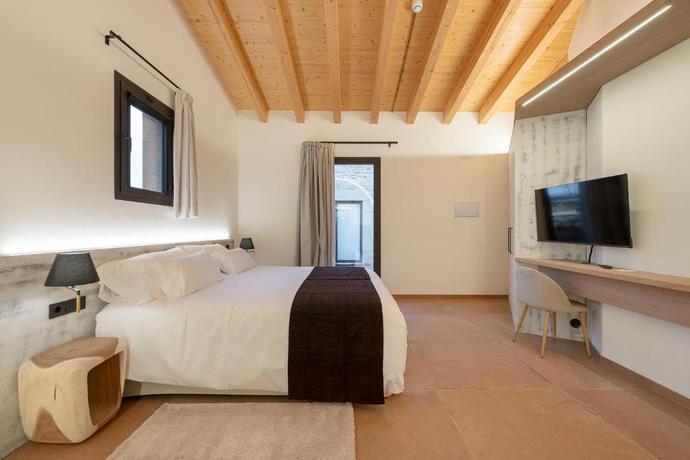 Imagen de la habitación del Hotel Mas Vidal Vilafreser. Foto 10