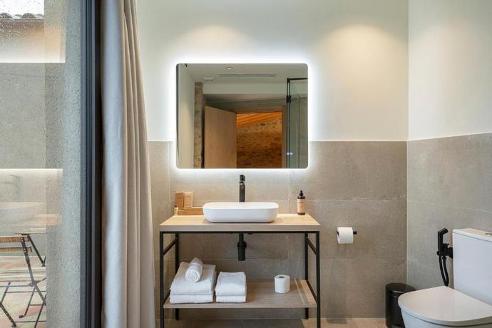 Imagen de la habitación del Hotel Mas Vidal Vilafreser. Foto 14