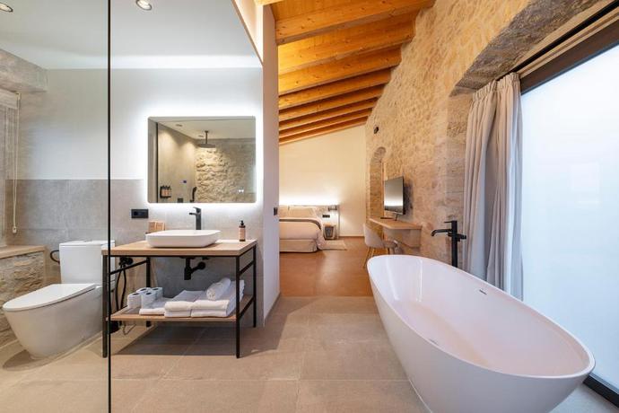 Imagen de la habitación del Hotel Mas Vidal Vilafreser. Foto 15