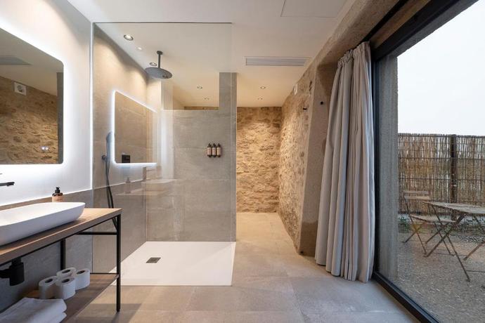 Imagen de la habitación del Hotel Mas Vidal Vilafreser. Foto 19