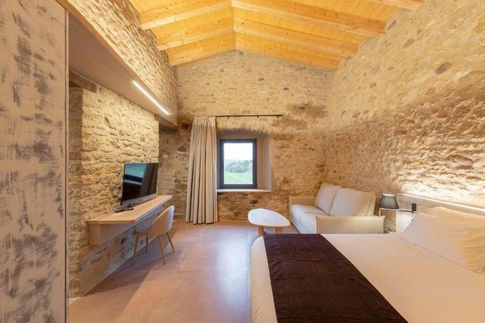 Imagen de la habitación del Hotel Mas Vidal Vilafreser. Foto 26