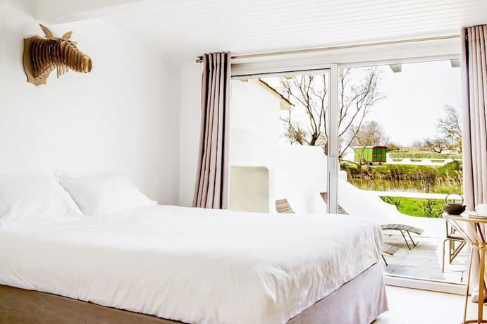 Imagen de la habitación del Hotel Mas de la Fouque H&ocirc;tel and Spa. Foto 6