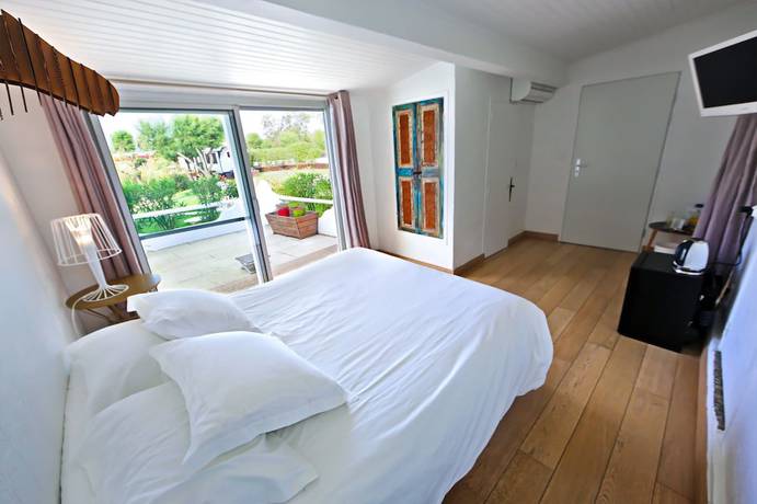 Imagen de la habitación del Hotel Mas de la Fouque H&ocirc;tel and Spa. Foto 19