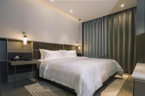 Imagen general del Hotel MasTer, tianhe. Foto 7