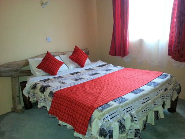 Imagen de la habitación del Hotel Masai Eco Lodge. Foto 20
