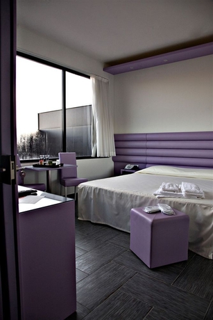 Imagen de la habitación del Hotel Masaniello Luxury. Foto 9