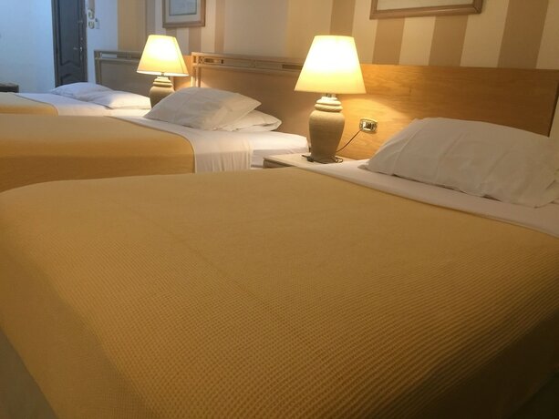 Imagen de la habitación del Hotel Masaya Suites. Foto 15