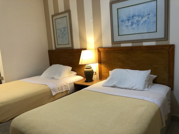 Imagen de la habitación del Hotel Masaya Suites. Foto 17