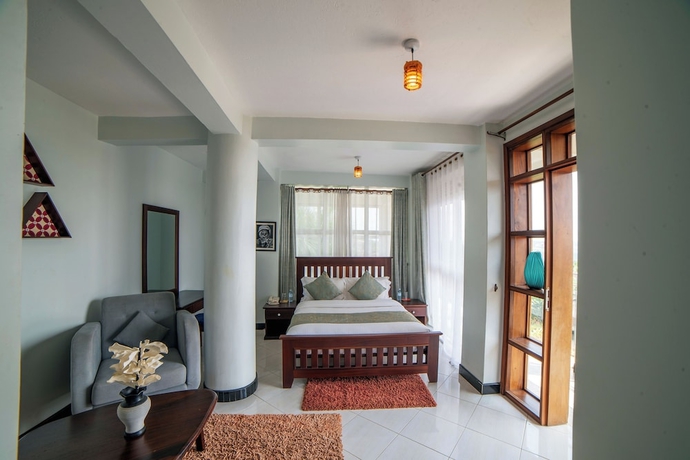 Imagen de la habitación del Hotel Masheda Palms Resort. Foto 9