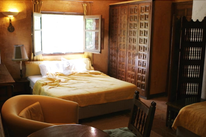 Imagen de la habitación del Hotel Masia Sumidors. Foto 13