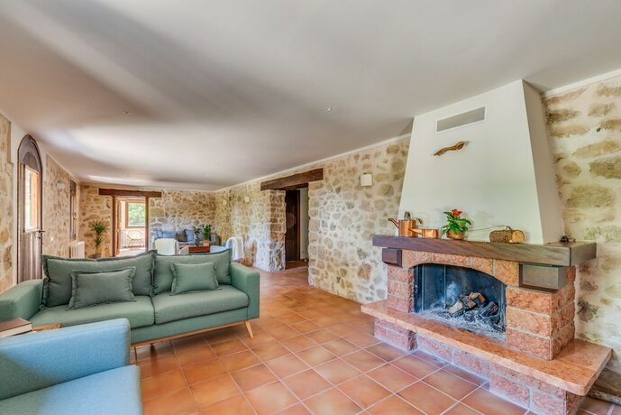 Imagen de la habitación del Hotel Masia Ventanell. Foto 19