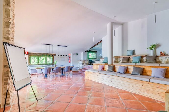 Imagen de la habitación del Hotel Masia Ventanell. Foto 20