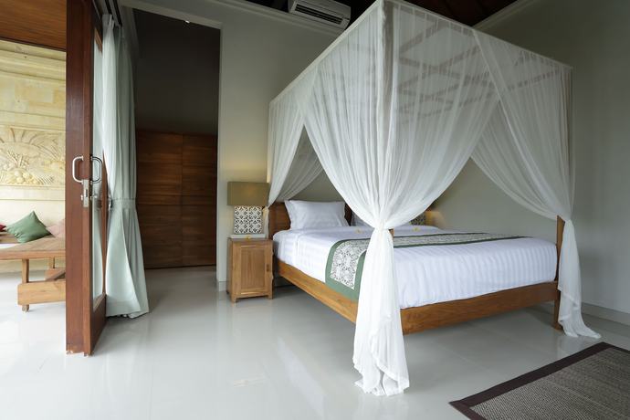 Imagen de la habitación del Hotel Masia Villa Ubud. Foto 17