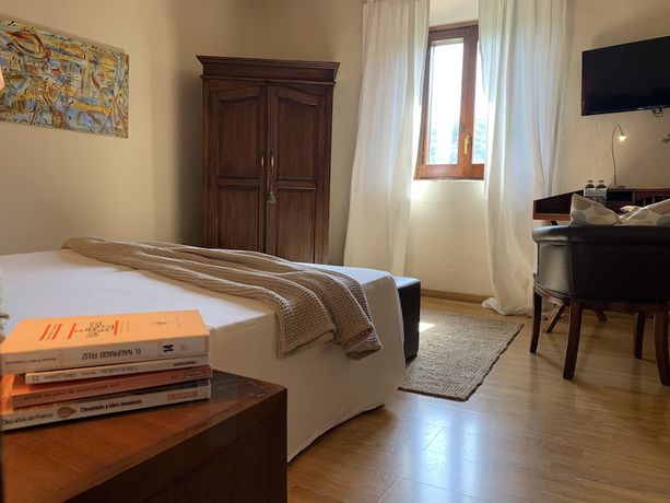 Imagen de la habitación del Hotel Masia la Palma. Foto 16