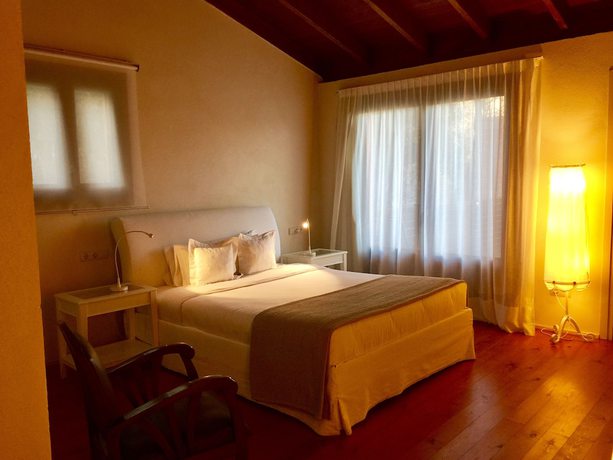 Imagen de la habitación del Hotel Masia la Palma. Foto 17