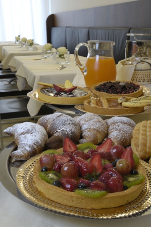 Imagen del bar/restaurante del Hotel Masini. Foto 2