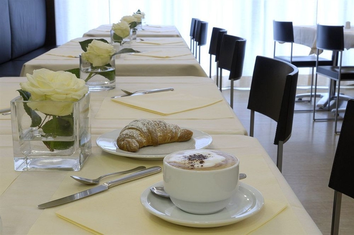 Imagen del bar/restaurante del Hotel Masini. Foto 6