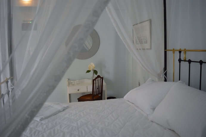 Imagen de la habitación del Hotel Masouriblu. Foto 13