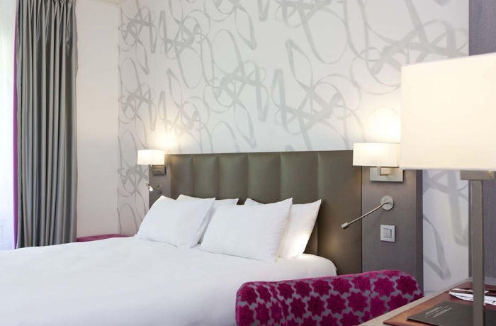 Imagen de la habitación del Hotel Masséna. Foto 4