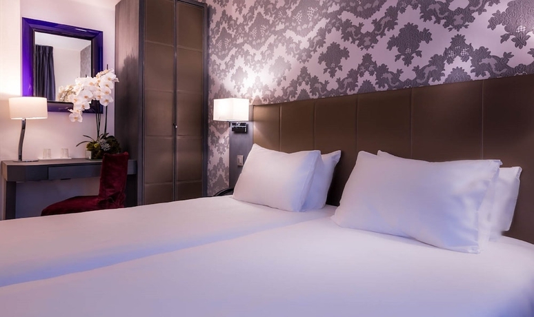 Imagen de la habitación del Hotel Masséna. Foto 13