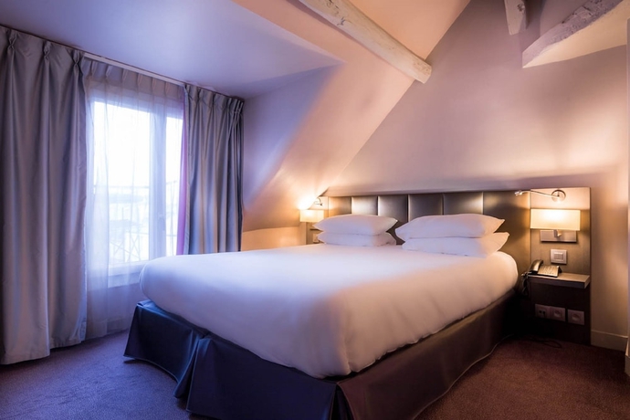 Imagen de la habitación del Hotel Masséna. Foto 15