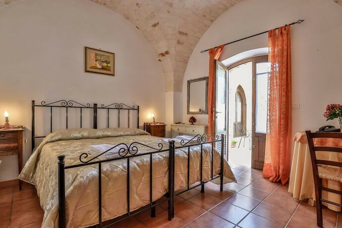 Imagen de la habitación del Hotel Masseria Casina Vitale. Foto 15