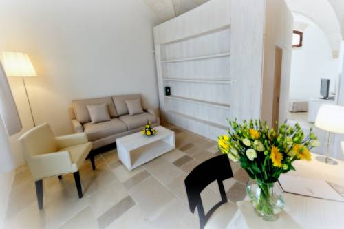 Imagen de la habitación del Hotel Masseria Corda Di Lana & Resort. Foto 5