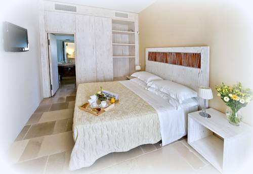 Imagen de la habitación del Hotel Masseria Corda Di Lana & Resort. Foto 13