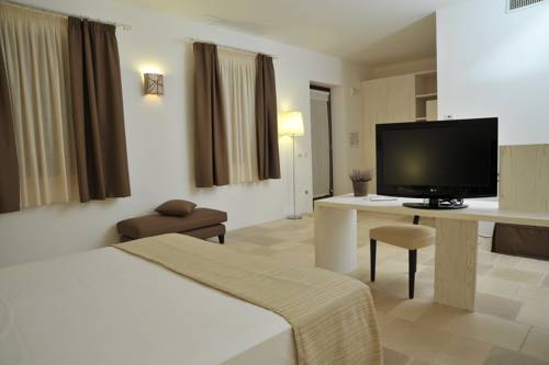 Imagen de la habitación del Hotel Masseria Corda Di Lana & Resort. Foto 15