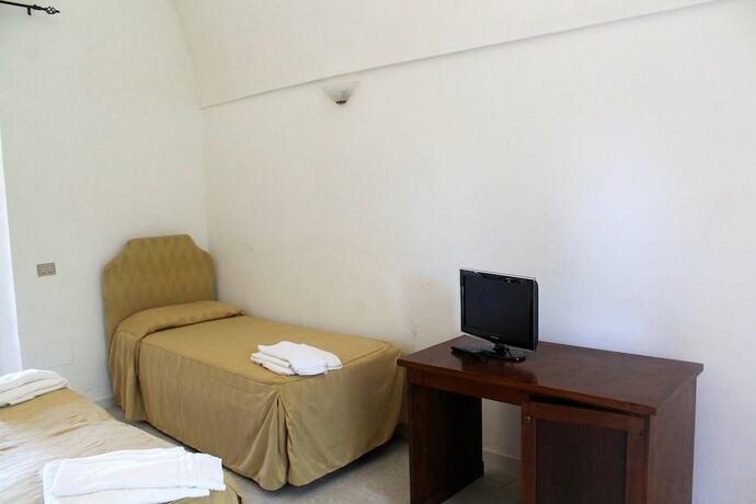 Imagen de la habitación del Hotel Masseria Fabrizio. Foto 19