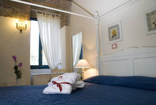 Imagen de la habitación del Hotel Masseria Fontanelle. Foto 15