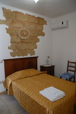 Imagen de la habitación del Hotel Masseria Grande. Foto 15