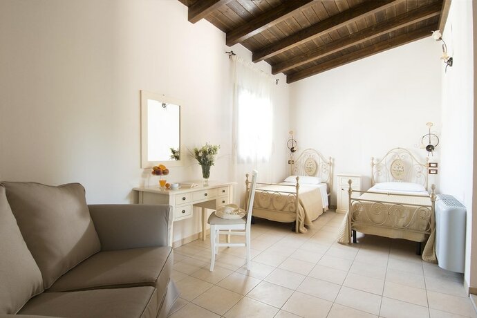 Imagen de la habitación del Hotel Masseria Grottella. Foto 17