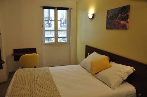 Imagen de la habitación del Hotel Massilia. Foto 10