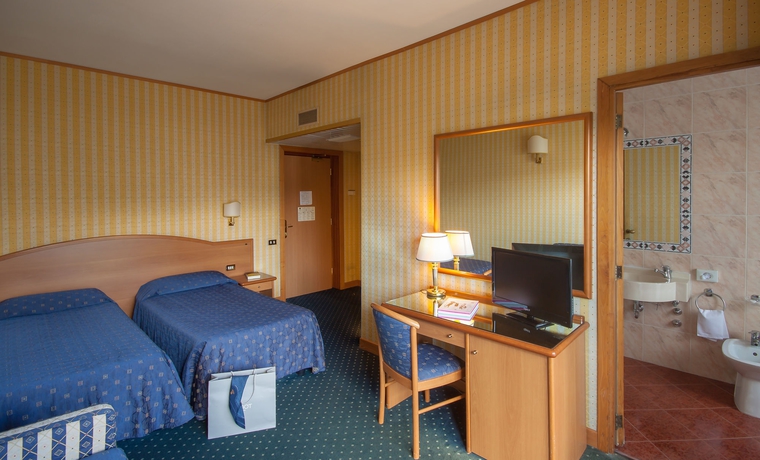 Imagen de la habitación del Hotel Massimi City Garden. Foto 10