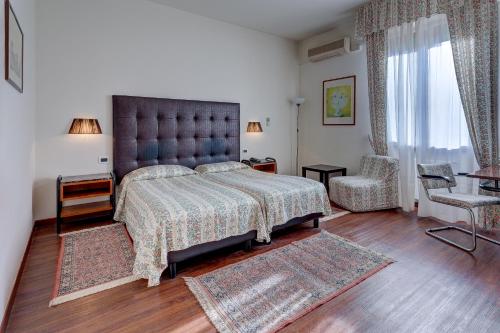 Imagen de la habitación del Hotel Massimo d\'Azeglio. Foto 5