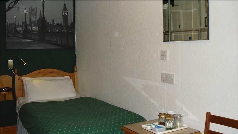 Imagen de la habitación del Hotel Masslink Guest House. Foto 6