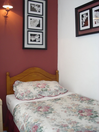 Imagen de la habitación del Hotel Masslink Guest House. Foto 11