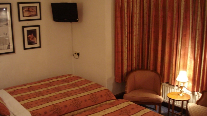 Imagen de la habitación del Hotel Masslink Guest House. Foto 14
