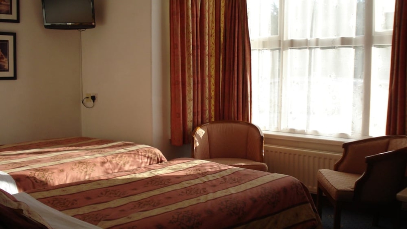Imagen de la habitación del Hotel Masslink Guest House. Foto 15
