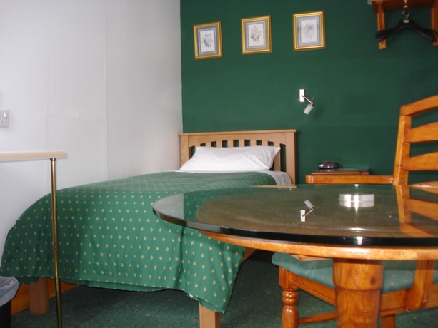 Imagen de la habitación del Hotel Masslink Guest House. Foto 16