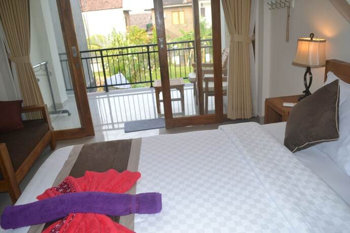 Imagen de la habitación del Hotel Master Homestay. Foto 18