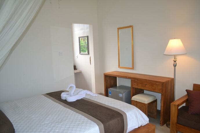 Imagen de la habitación del Hotel Master Homestay. Foto 20
