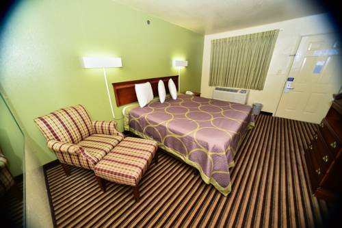Imagen de la habitación del Hotel Masters Inn Tucker. Foto 5
